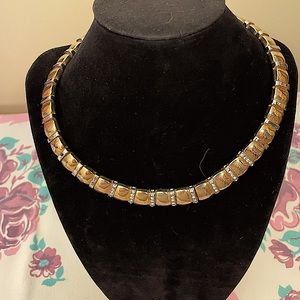 Coppery Gold Choker w/Rhinestones in front. Vintage not marked foldover clasp.